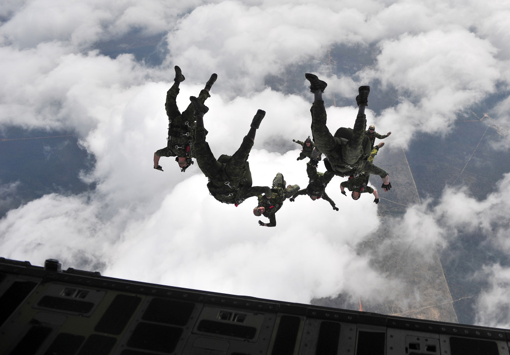 Canadian special operation regiment members conduct a freefall jump