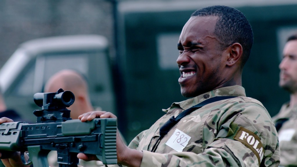 Recruits struggle with holding their weapons in a stress test. Photo: BBC