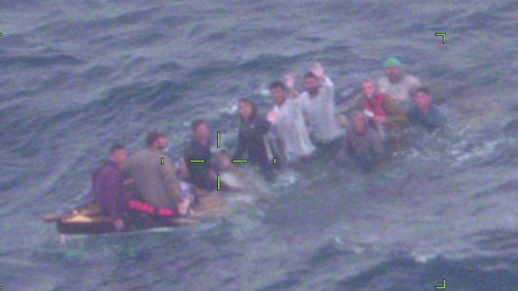 Coast Guard rescues 10 migrants from sinking vessel off Florida ...